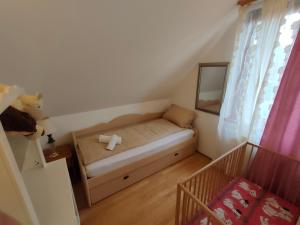 Posteľ alebo postele v izbe v ubytovaní Three Family Apartments
