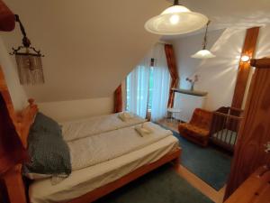 Posteľ alebo postele v izbe v ubytovaní Three Family Apartments