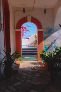 an archway in a building with a painting on the wall at Hotel Costa Diva in Praiano