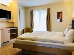 Voodi või voodid majutusasutuse Hotel Felmis toas