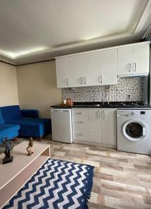 Køkken eller tekøkken på Hesaplı köfteci otel