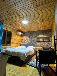 En eller flere senge i et værelse på Hesaplı köfteci otel