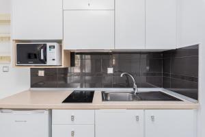 A kitchen or kitchenette at Hotel Aeollos