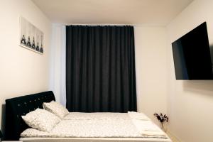 Posteľ alebo postele v izbe v ubytovaní Püspök Flat