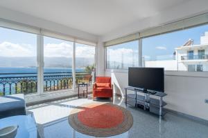 TV a/nebo společenská místnost v ubytování Ocean Apartment