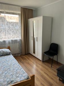 Posteľ alebo postele v izbe v ubytovaní Dwunastka