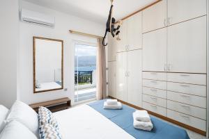 Postel nebo postele na pokoji v ubytování Ocean Apartment