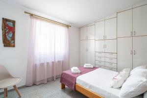 Postel nebo postele na pokoji v ubytování Ocean Apartment