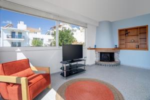 TV a/nebo společenská místnost v ubytování Ocean Apartment