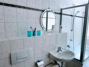 Koupelna v ubytování Famielienapartment An der Forellenschänke