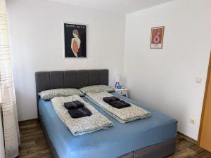 Postel nebo postele na pokoji v ubytování Famielienapartment An der Forellenschänke