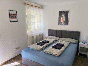 Postel nebo postele na pokoji v ubytování Famielienapartment An der Forellenschänke