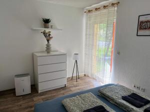 Postel nebo postele na pokoji v ubytování Famielienapartment An der Forellenschänke + 37 fotografií