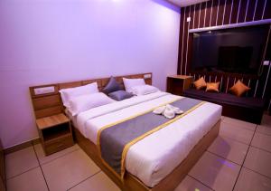 Letto o letti in una camera di Wildside Wayanad