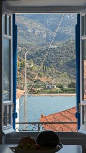 a view of the water from a window of a ship at Thama Poros-Nostos in Poros