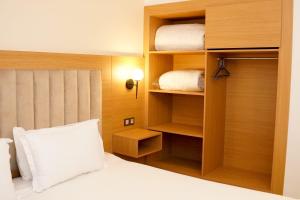 Postel nebo postele na pokoji v ubytování Appart-Hotel EZZAHIA by HMS