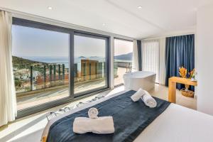 Postel nebo postele na pokoji v ubytování Villa Pax - Kalkan Villa