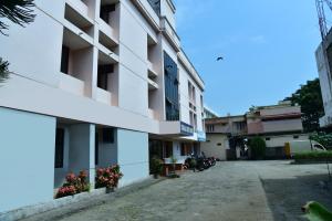 a view of the outside of a building at Sithara Guest House in Palakkad