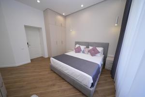 Ένα ή περισσότερα κρεβάτια σε δωμάτιο στο Ser In Hotel