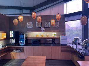 Η κουζίνα ή μικρή κουζίνα στο Tenlien onsen Hot Spring Hotel