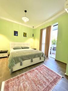 Postel nebo postele na pokoji v ubytování Floridas Beach Suites + 8 fotografií