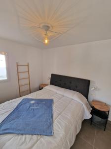 Hoy Caleta Apartments客房内的一张或多张床位