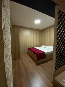 Ένα ή περισσότερα κρεβάτια σε δωμάτιο στο stefanias apartment