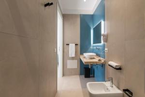 Ένα μπάνιο στο SOTTO LE STELLE Comfort Room +62 φωτογραφίες