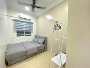Letto o letti in una camera di Sekinchan 2008 Home 悦客 盐系奶咖风民宿