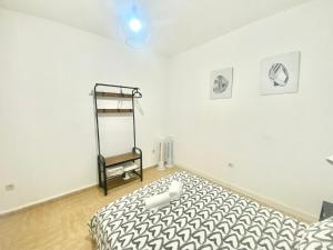 Łóżko lub łóżka w pokoju w obiekcie Méndez Álvaro Callejo Street