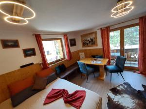 A seating area at Ferienwohnung Felix-Adults Only