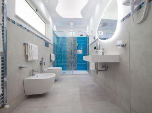 Koupelna v ubytování Hotel Blu Eden
