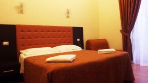 Voodi või voodid majutusasutuse Hotel Nautilus toas