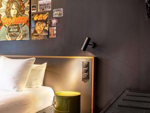 Postel nebo postele na pokoji v ubytování ibis Styles Paris Villejuif