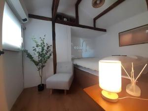 TV a/nebo společenská místnost v ubytování New Hanok