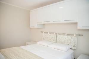 Postel nebo postele na pokoji v ubytování Apto acolhedor em Porto Alegre WT5466