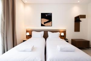 Voodi või voodid majutusasutuse Hotel El Toro Tanger toas