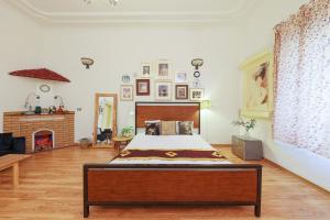 a bedroom with a bed and a fireplace at Cozy Fun Homestay 12 in Hanoi
