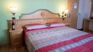 Postel nebo postele na pokoji v ubytování Hotel Bellevue