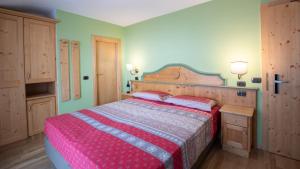 Postel nebo postele na pokoji v ubytování Hotel Bellevue