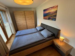 Postel nebo postele na pokoji v ubytování Apart 657