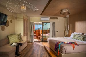Postel nebo postele na pokoji v ubytování Esperides Resort Crete, The Authentic Experience