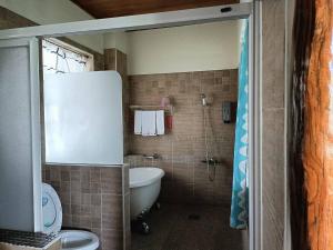 Phòng tắm tại Xian Qing Yu Zhi Homestay