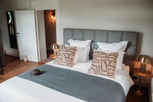 Postel nebo postele na pokoji v ubytování B&B Maison Mairie Hasselt