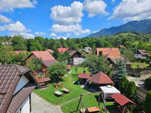 an aerial view of a village with houses at Pensiunea Sarah Bran in Bran