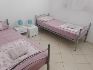 A bed or beds in a room at Appartamento La Bonifica