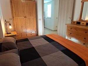 Postel nebo postele na pokoji v ubytování Relais Frantoio delle Pietre