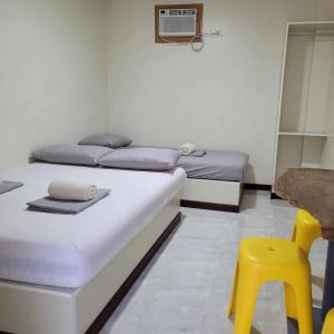 Postel nebo postele na pokoji v ubytování Borj Hotel