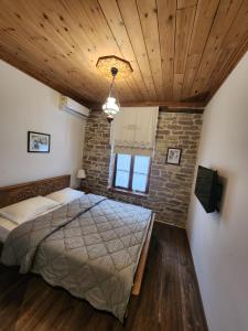Postel nebo postele na pokoji v ubytování 4 Rooms 1940