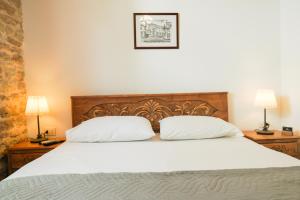 Postel nebo postele na pokoji v ubytování 4 Rooms 1940